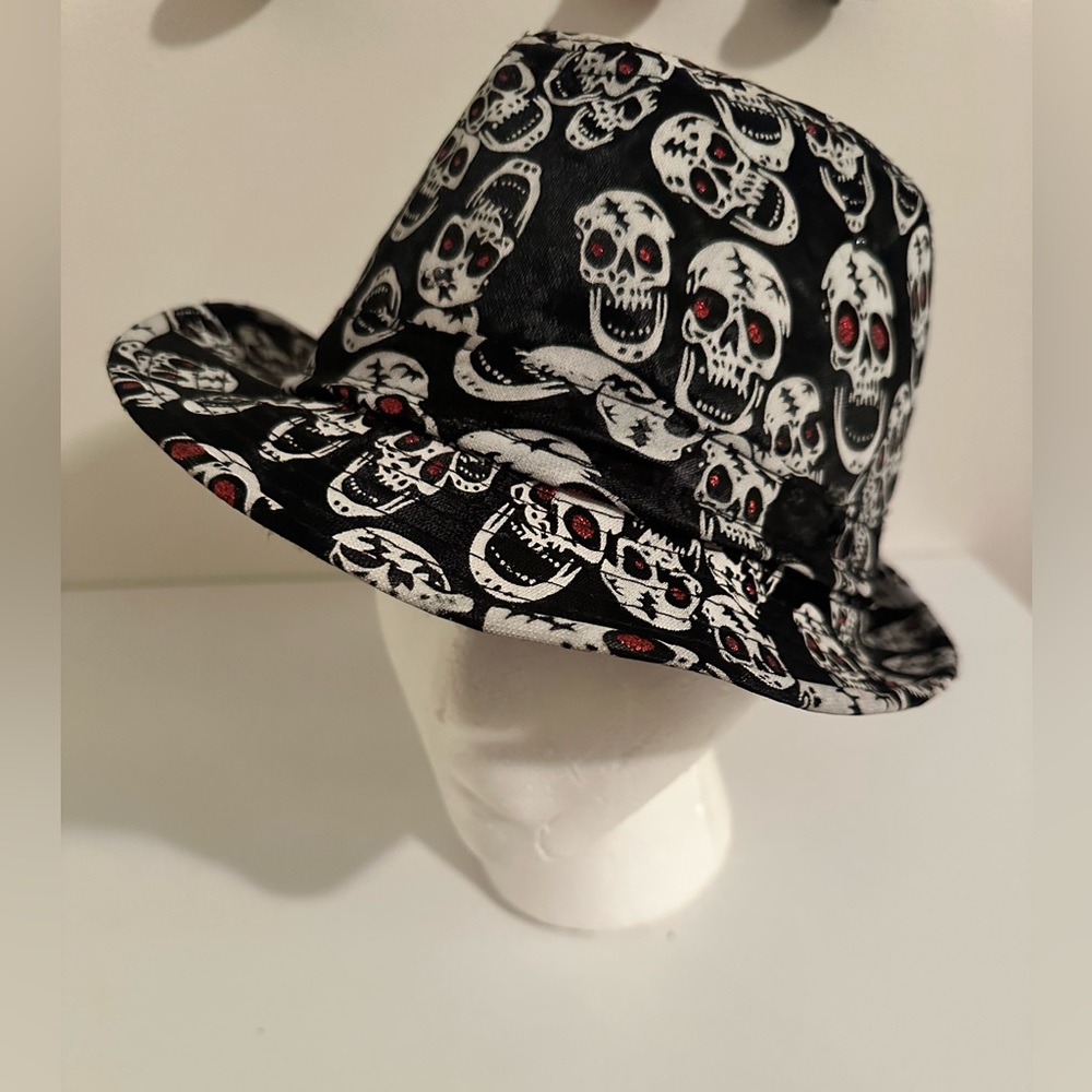 NWOT HAT WITH SKULLS ALL OVER.